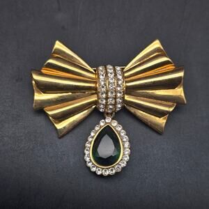 Avon 2004 Gold Tone Bow Brooch with Green Rhinestone Charm Vintage